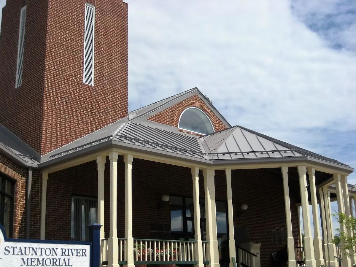 Skilled roofing craftsmen working on a residential roof in Rehoboth
